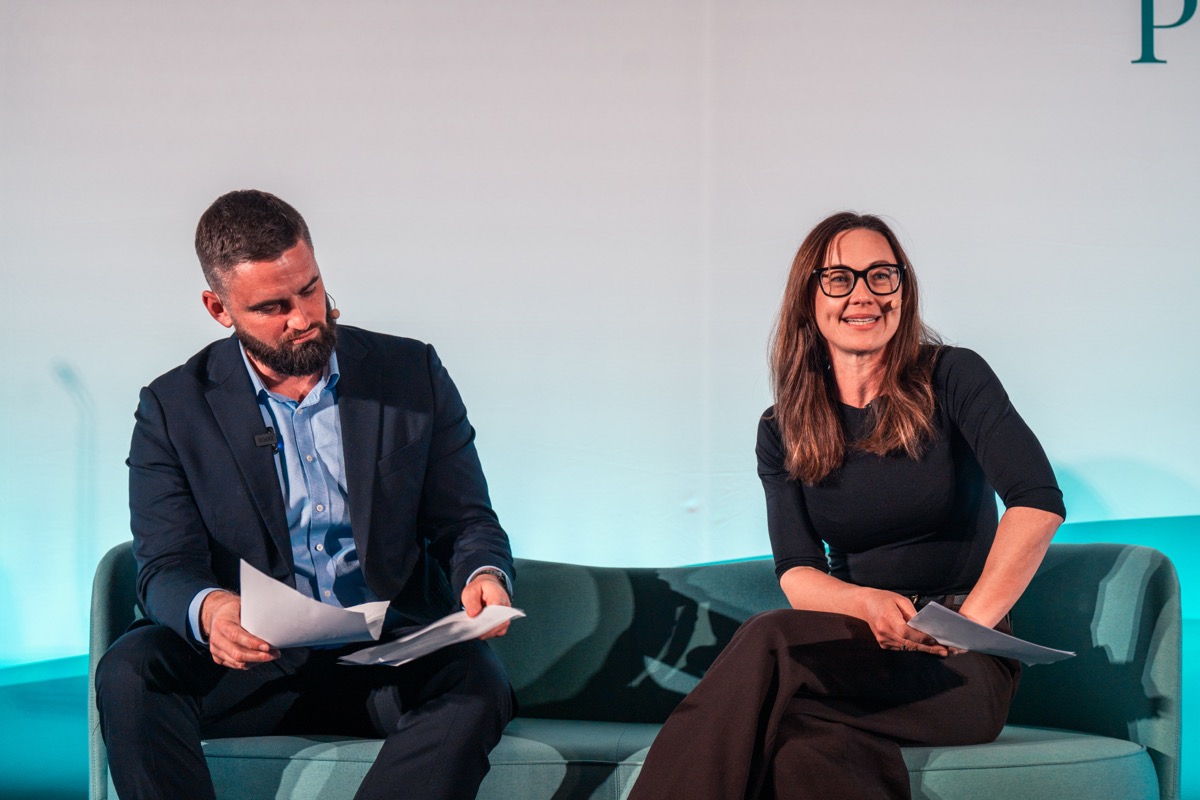 Dane Mitchell and Rose Plater hosting a live audience Q&A session on stage